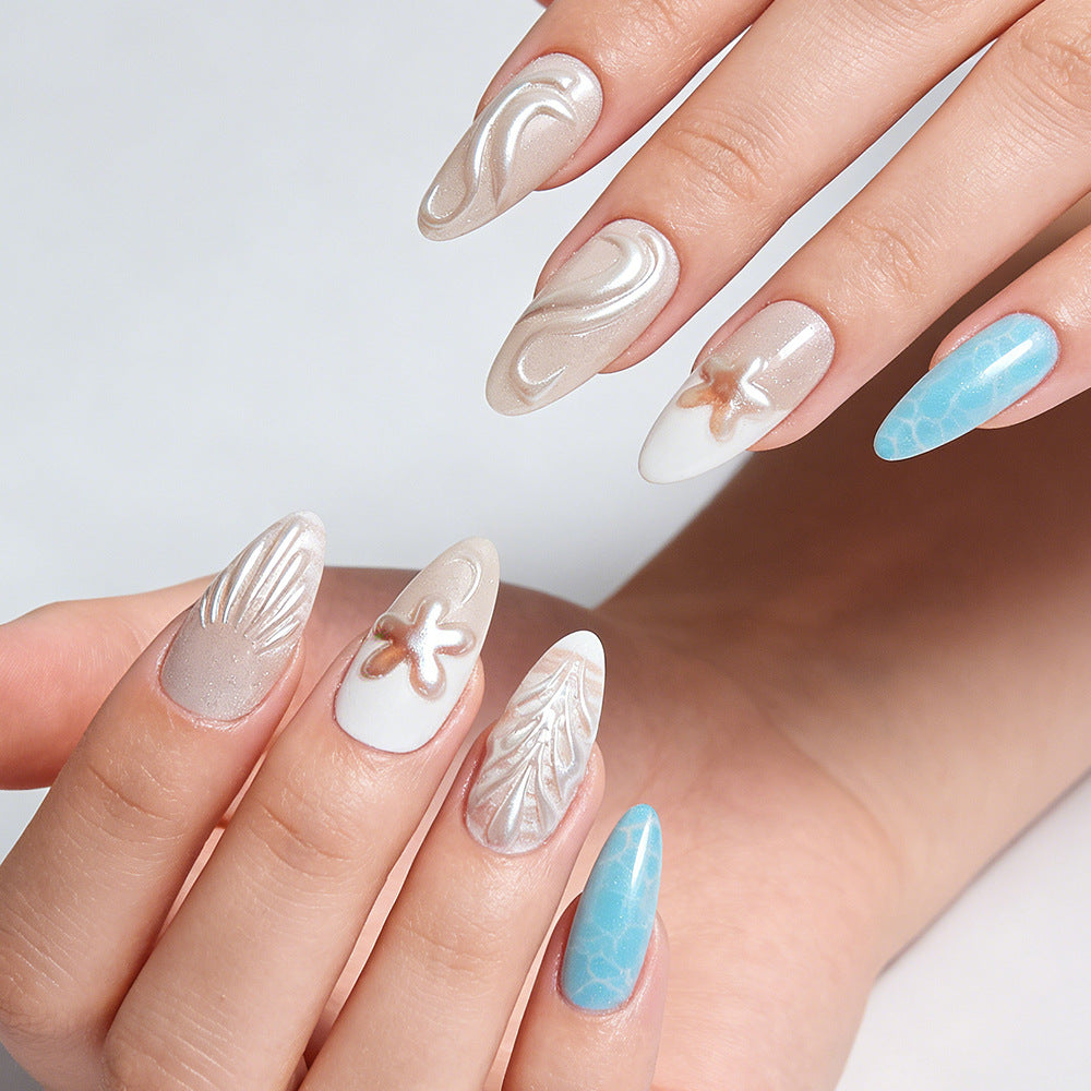 Ocean Breeze Medium Almond Cream and Aqua Nail Set with Unique Textured Designs