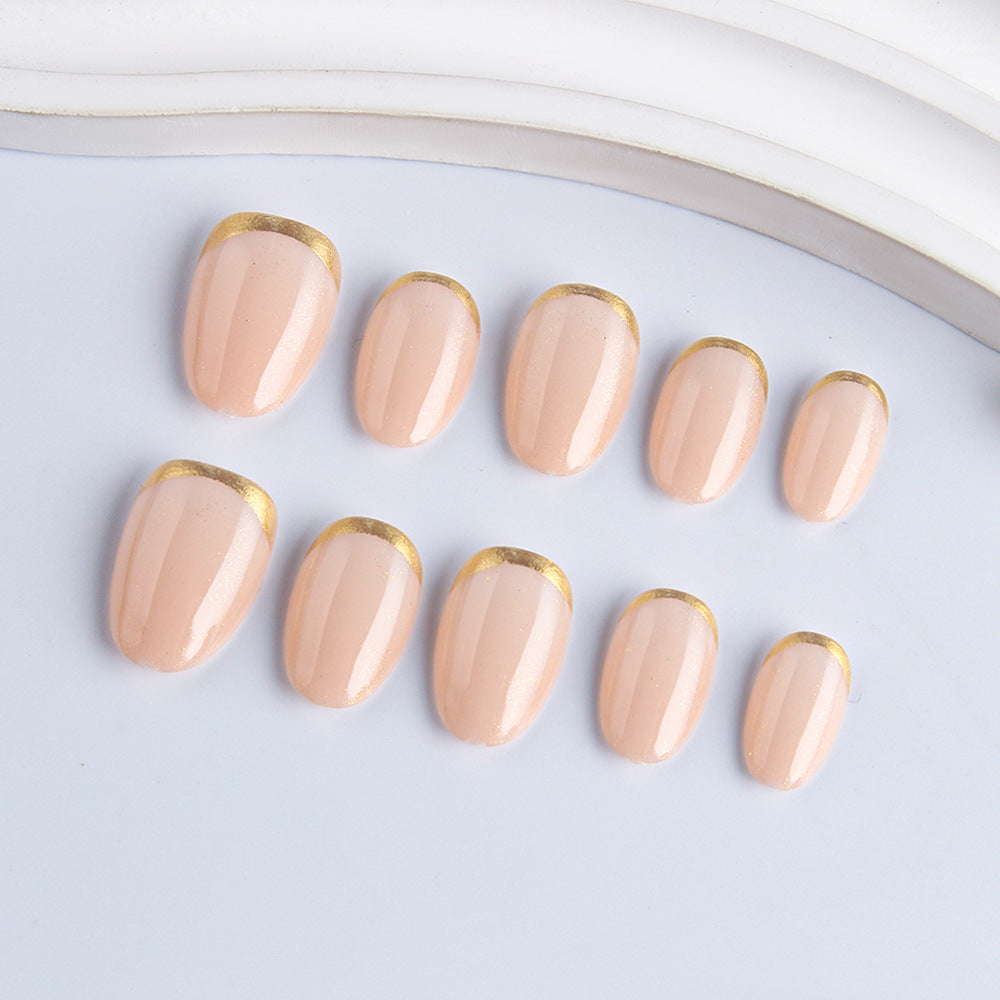 Glamorous Elegance Classic Short Almond Beige Nails with Gold Tips and Glittery Finish