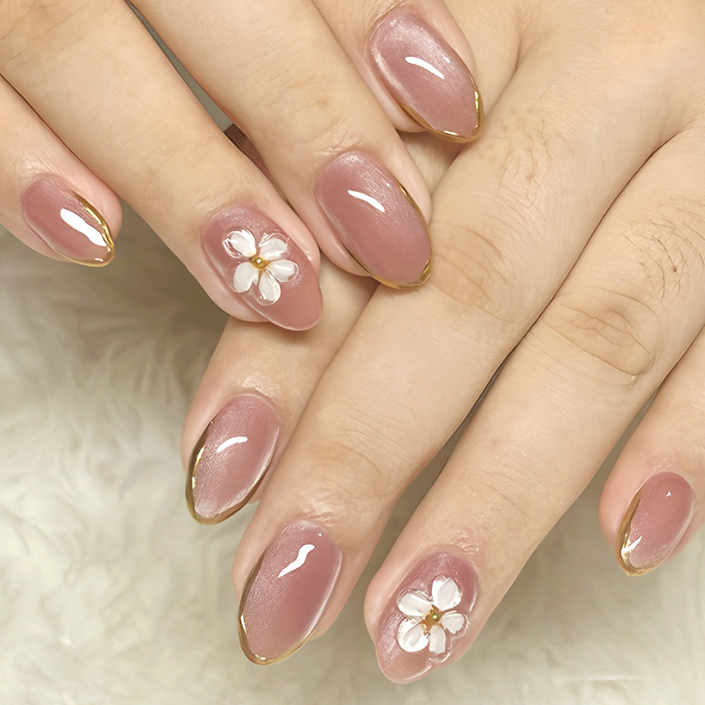 Blossom Elegance Medium Oval Pink Press On Nail Set with Floral Accent and Golden Tips