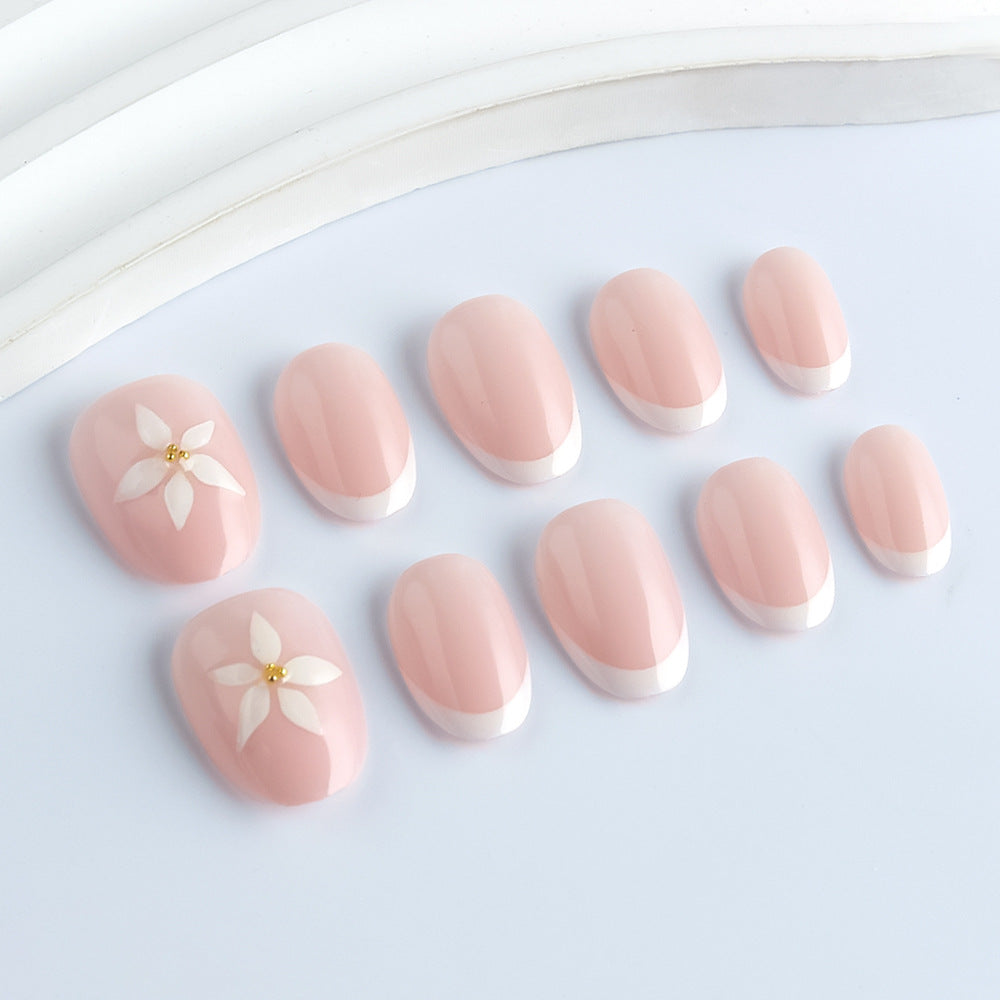 Blooming Elegance Medium Oval Pink French Tip Press On Nail Set with Floral Accent