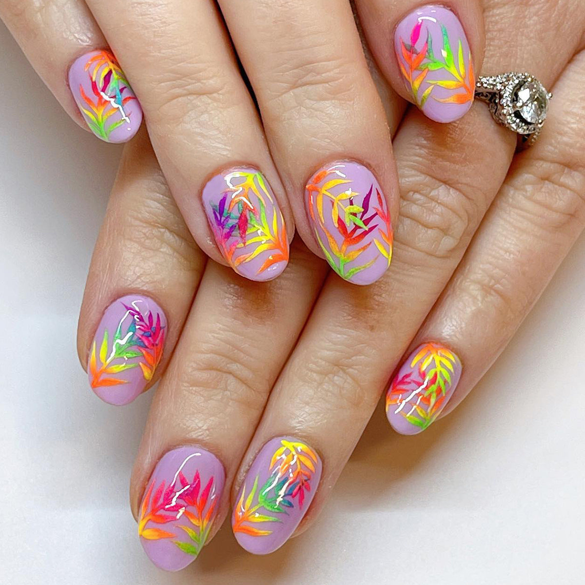 Tropical Paradise Medium Almond Lavender Press On Nail Set with Vibrant Leaf Artwork