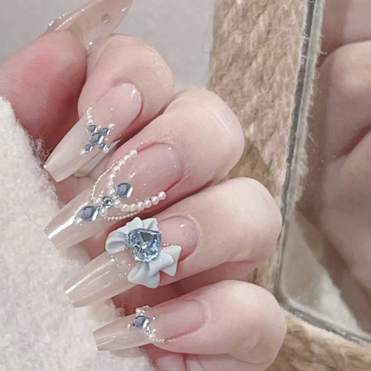 Elegant Romance Long Coffin Clear Nails with Blue Floral Gems and Pearl Accents