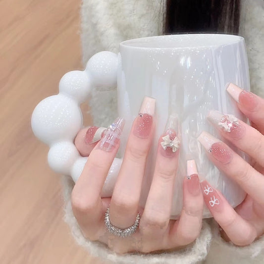 Chic Blossom Radiance Long Coffin Pink Transparent Nails with Floral Accents and Glittering Gems