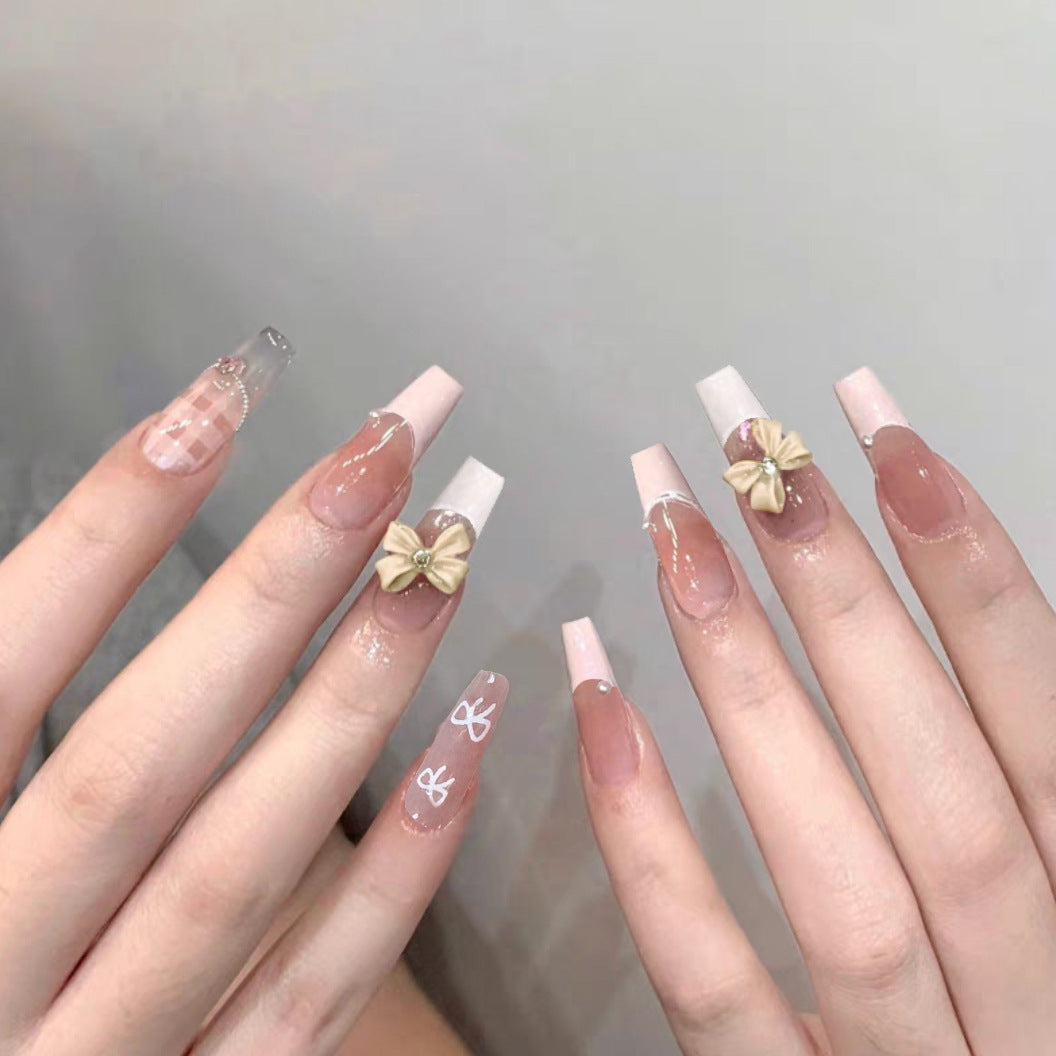 Charming Elegance Long Coffin Pink and Clear Nails with Bow Accent and Glitter Detail