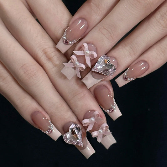 Romantic Elegance Long Coffin Pink Press on Nail Set with Heart and Ribbon Accents