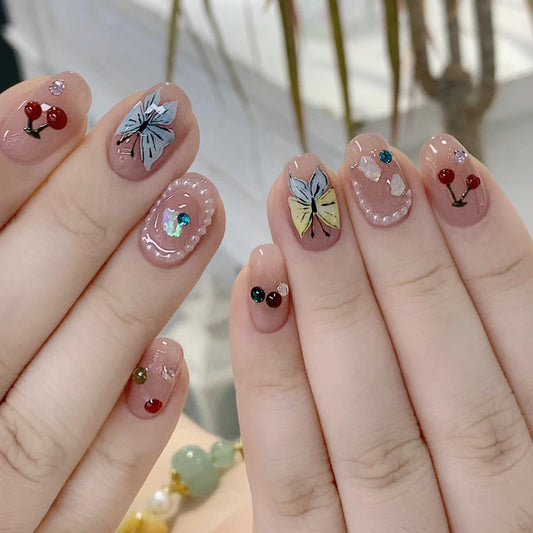 Whimsical Butterfly Garden Short Squoval Shaped Beige Press On Nail Set with Charming Floral and Fruit Accents