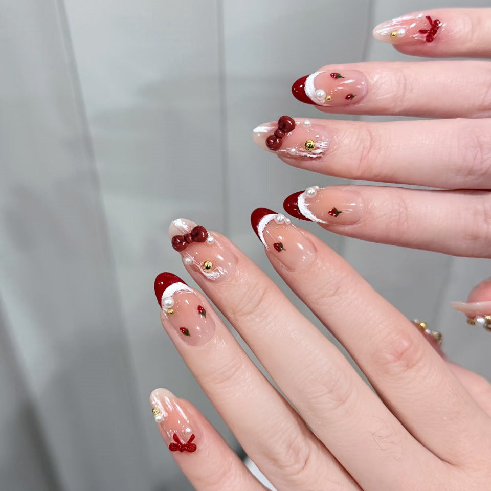 Festive Elegance Long Oval Red White Ombre with Charming Decorative Accents Press-On Nail Set