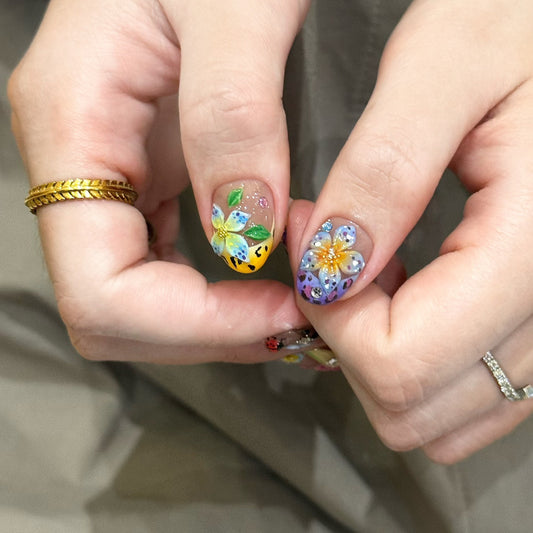 Whimsical Floral Press On Nail Set Short Almond Shape Vibrant Multi-Colored with Metallic Accents