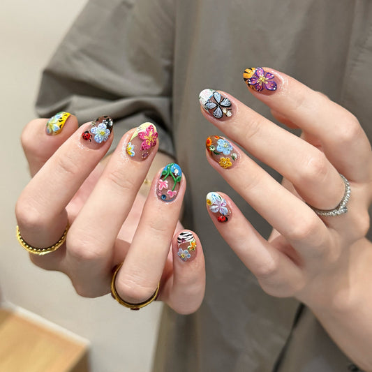 Whimsical Garden Inspired Floral Press On Nail Set Short Almond Multicolor with Three Dimensional Flower Accents