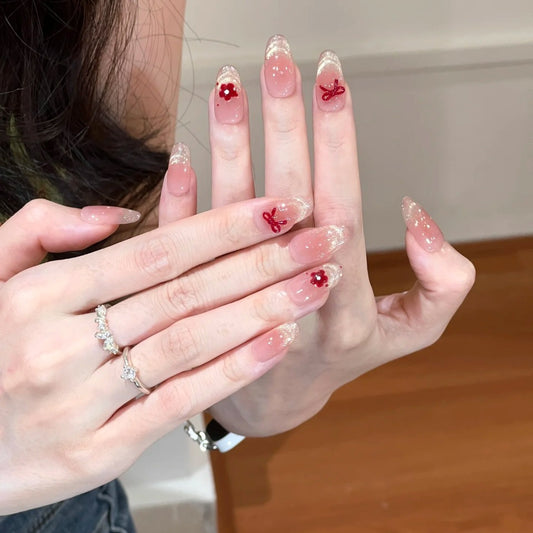 Charming Blossom Long Almond Shaped Translucent Pink Press On Nail Set with Glitter and Floral Accents