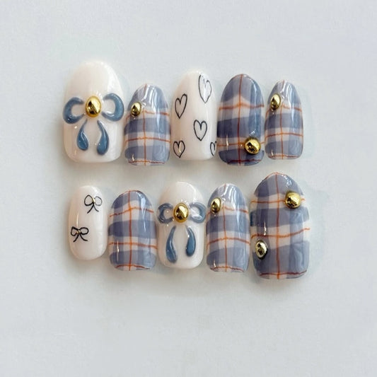 Charming Bowtied Dreamy Medium Oval Shaped Grey and White Press On Nail Set with Delightful Golden Accents