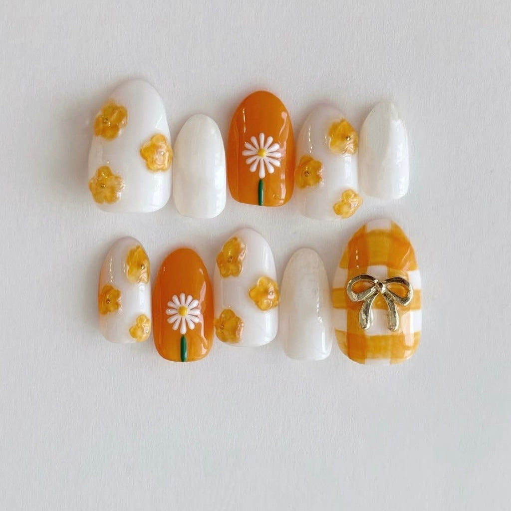 Sunny Garden Delight Medium Almond Yellow and White Press On Nail Set with Floral Designs and Charming Ribbon Detail
