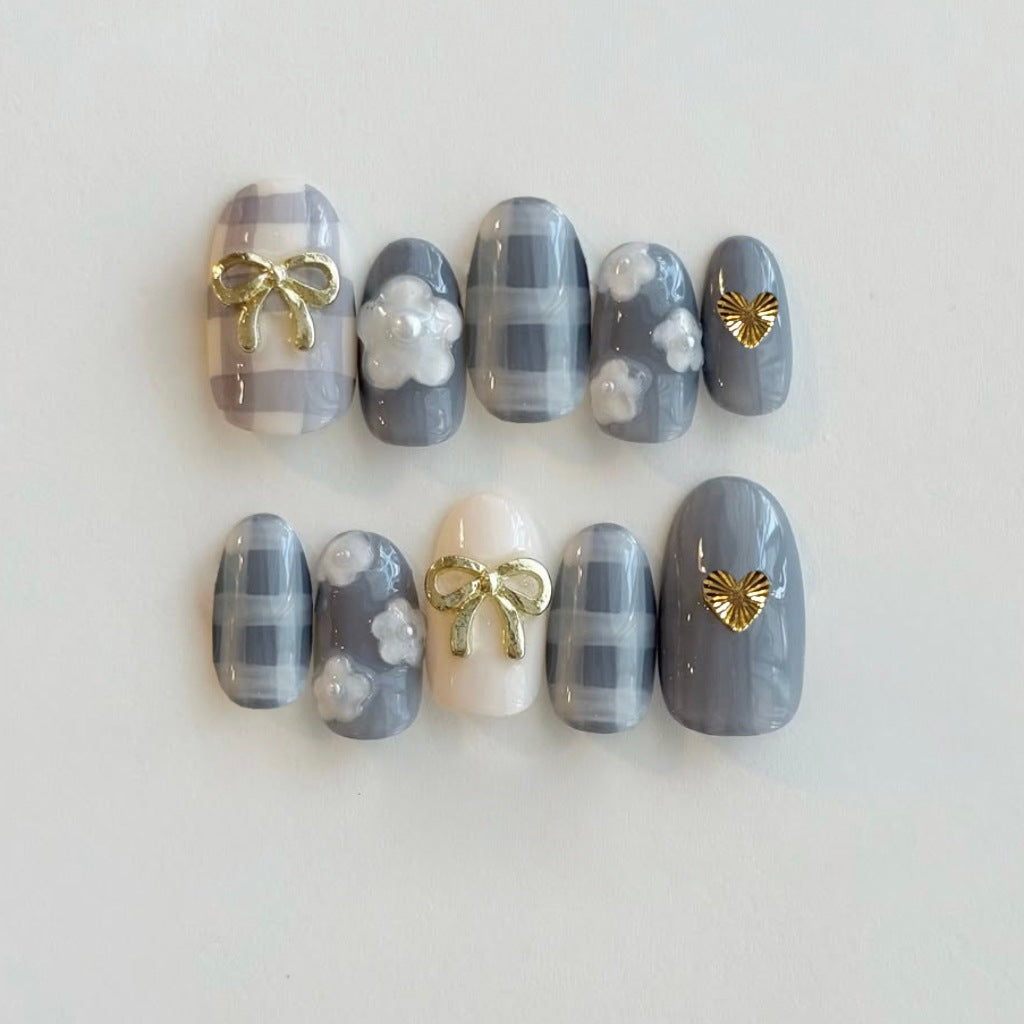 Chic Elegance Gray Medium Oval Press on Nail Set with Cute Bow and Heart Accents