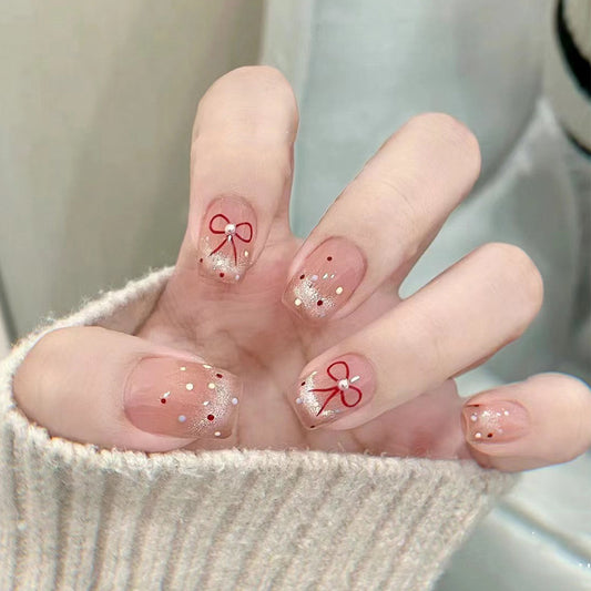 Festive Charm Short Square Beige Press On Nail Set with Red Bows and Glitter Accents