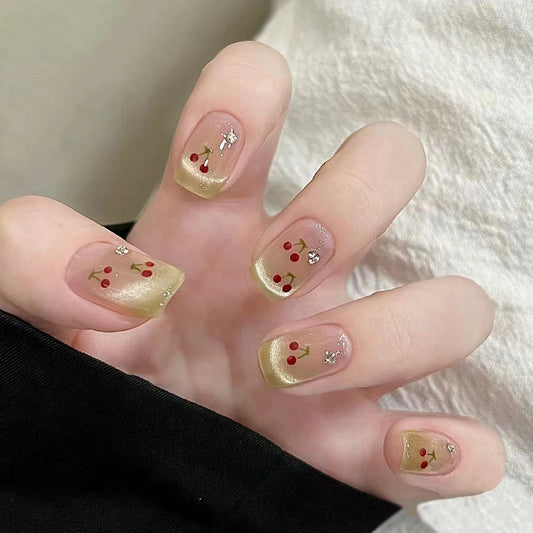 Cherry Blossom Delight Short Square Transparent Gold Press On Nail Set with Floral Design and Glitter Accents