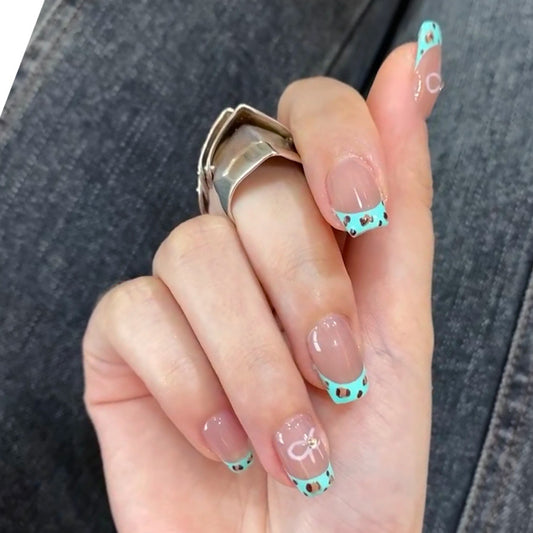 Tropical Paradise Short Round Mint Green French Tip Press On Nail Set with Animal Print Accents and Glitter Detail
