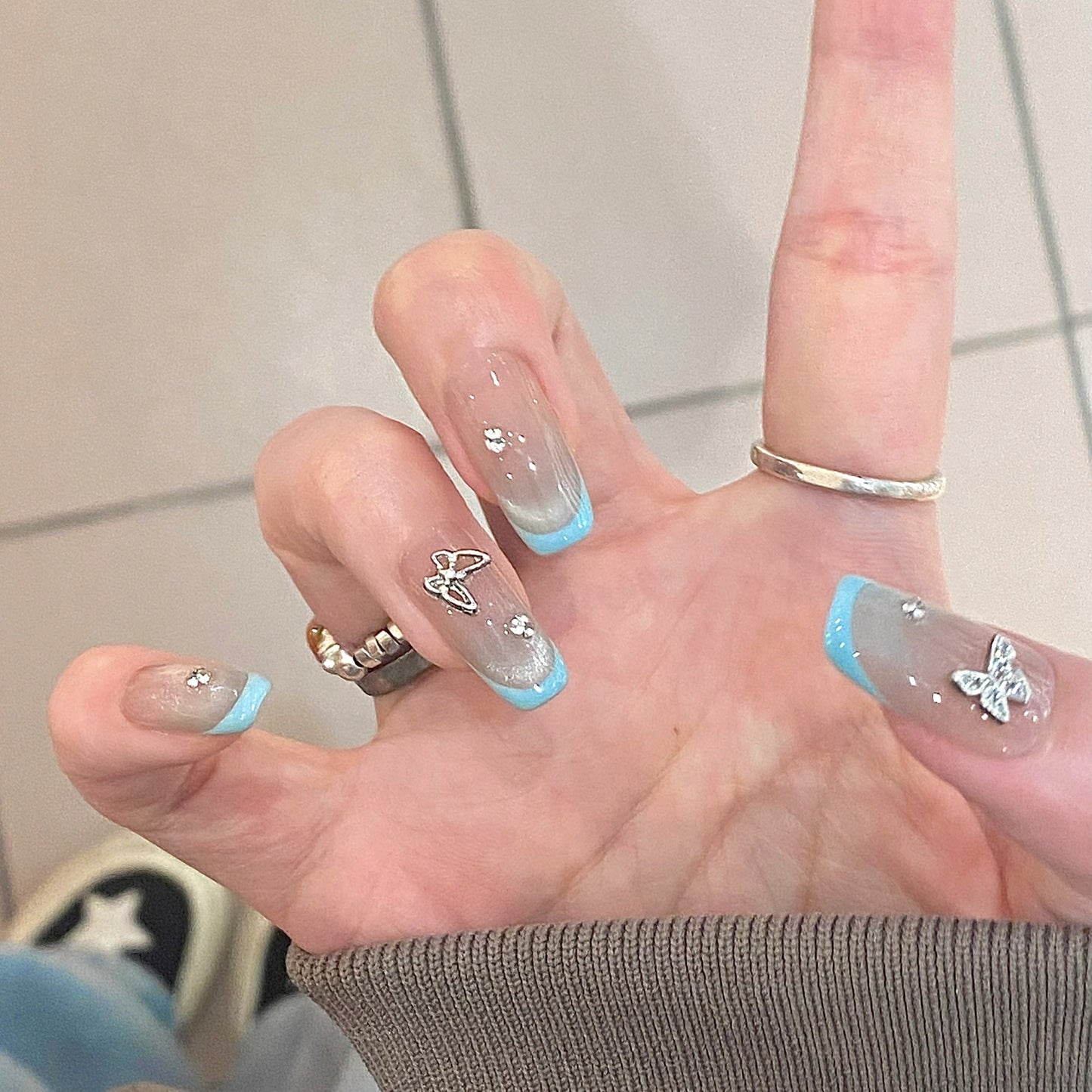 Enchanting Elegance Long Square Transparent with Blue Tips and Butterfly Accents Press-On Nail Set