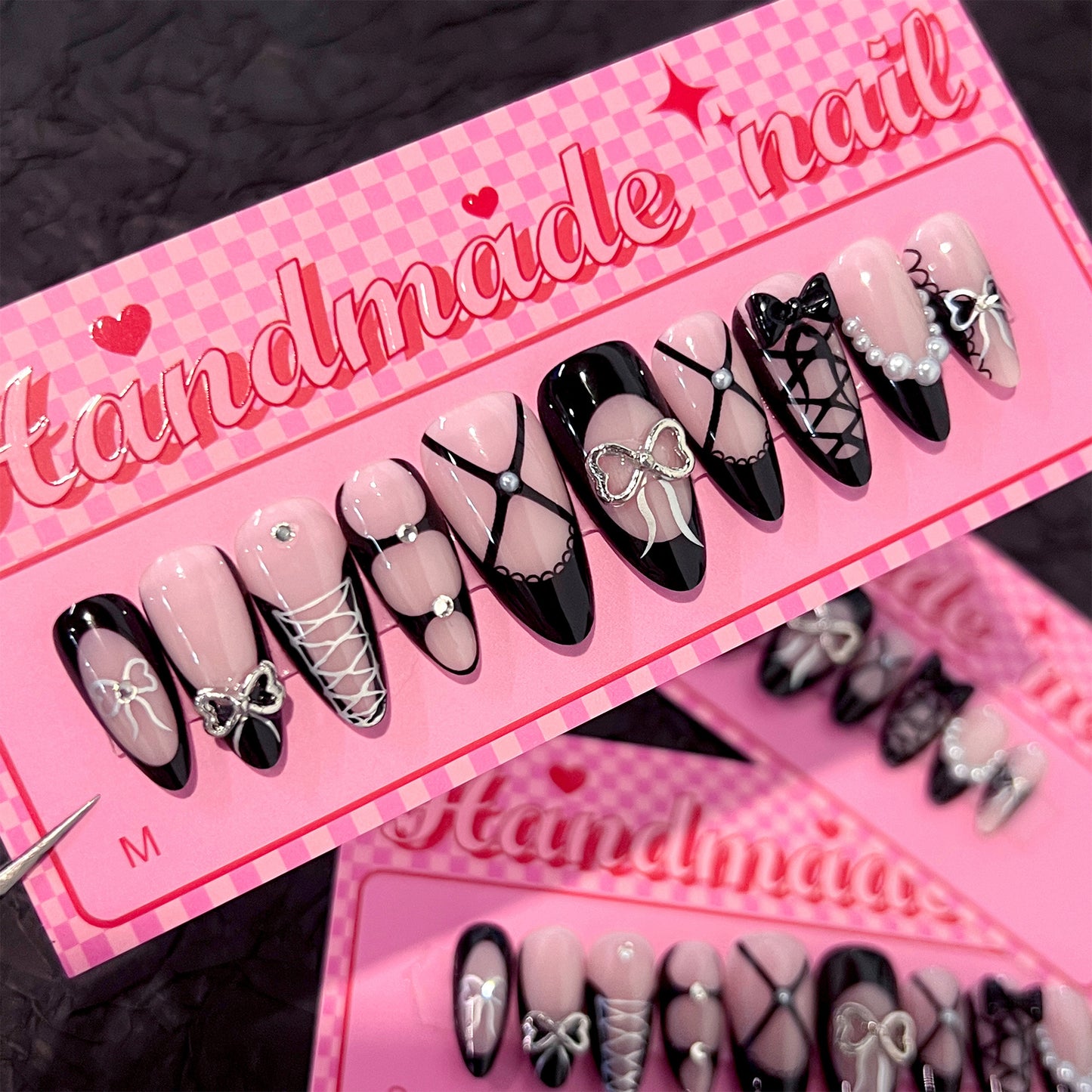 Chic Gothic Elegance Long Almond Pink and Black Press-On Nails with Bow and Lace Details
