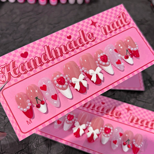 Sweetheart Glamour Medium Almond Pink and White Press On Nail Set with Heart and Bow Embellishments