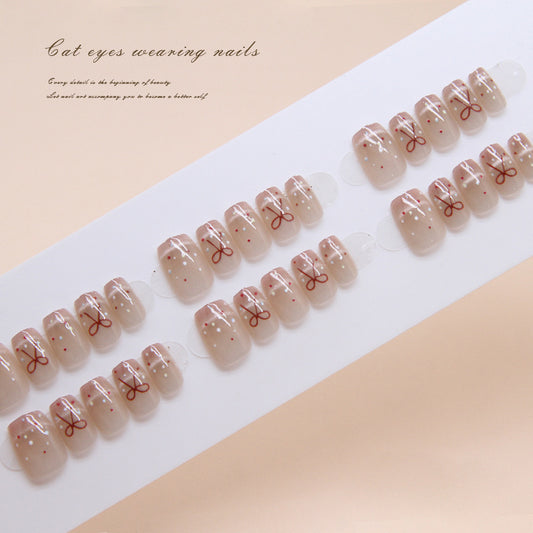 Boho Chic Short Round Beige Press On Nail Set with Intricate Bow Design and Sparkle Accents