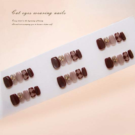 Enchanting Elegance Glossy Short Square Shaped Burgundy and Beige Nail Set with Unique Cat Eye Accent