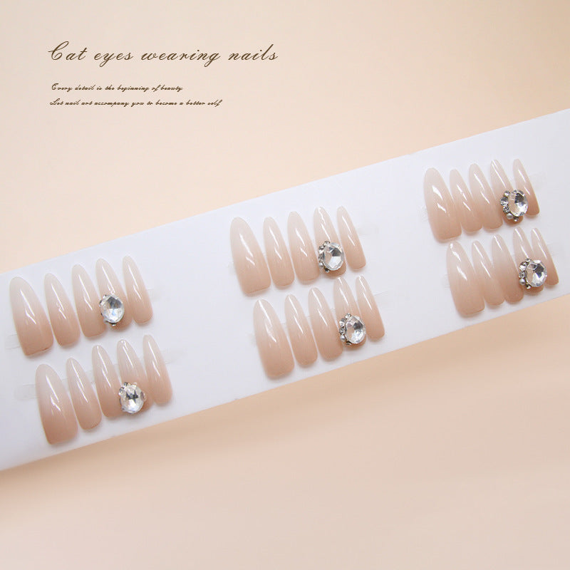 Enchanting Cat Eye Elegance Long Almond Shaped Soft Beige Press On Nail Set with Sparkling Rhinestone Accents