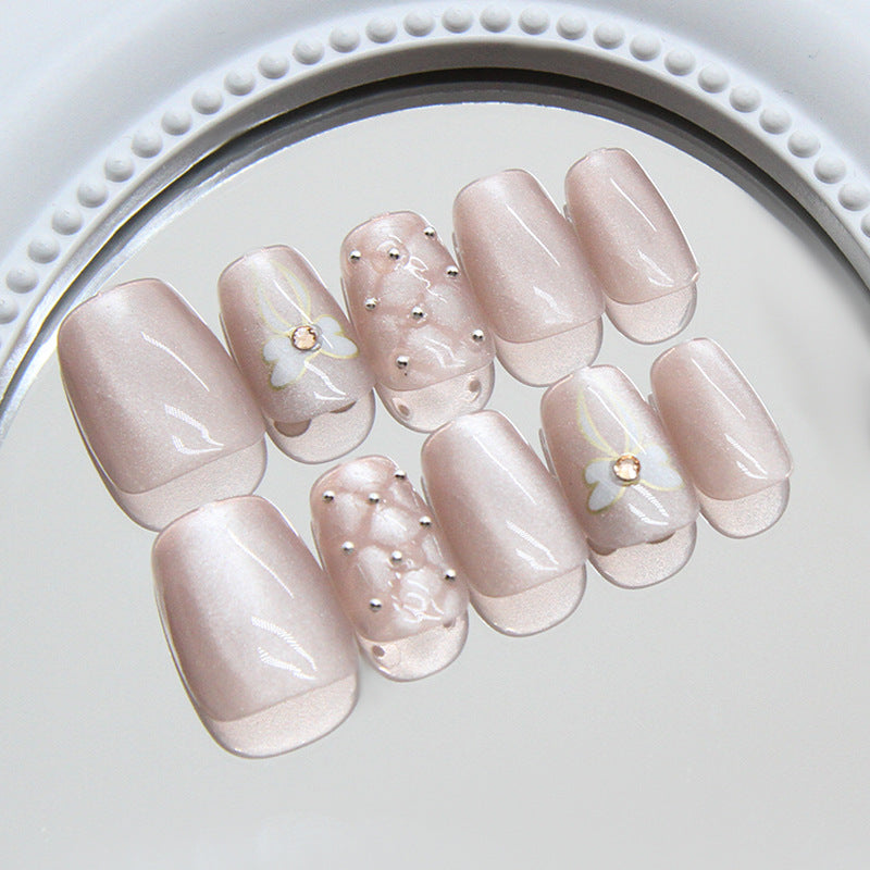 Whimsical Blossom Elegant Short Square Soft Pink Nails with Floral Accents and Gem Details