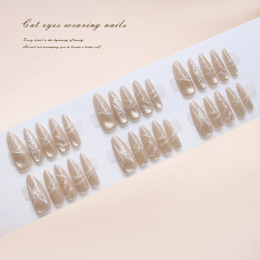 Enchanting Cat Eye Transformation Long Almond Beige Nails with Elegant Floral Designs