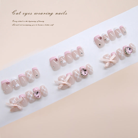 Whimsical Elegance Short Square Soft Pink Press On Nail Set with Cat Eye Design and Adorned Ribbons
