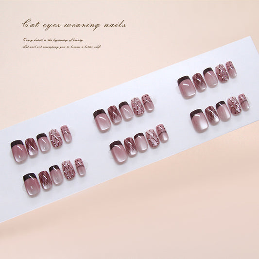 Set of nail designs on a white paper with a beige background