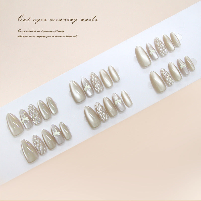 Elegant Cat Eyes Inspired Press On Nail Set Medium Almond Champagne Color with Unique Floral Detailing