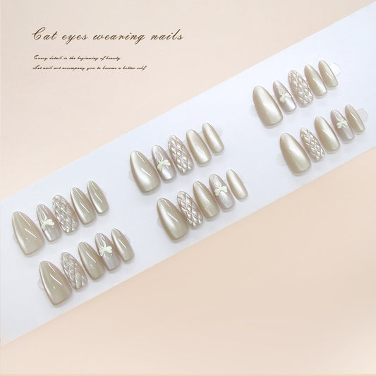 Elegant Cat Eyes Inspired Press On Nail Set Medium Almond Champagne Color with Unique Floral Detailing