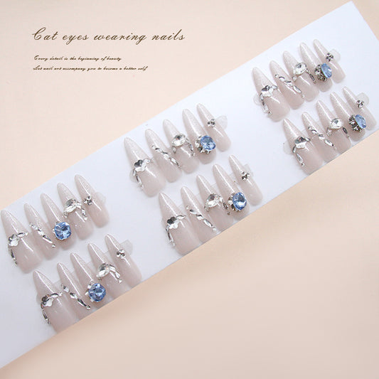 Whimsical Elegance Long Almond Beige Nail Set with Cat Eye Effect and Sparkling Gem Accents