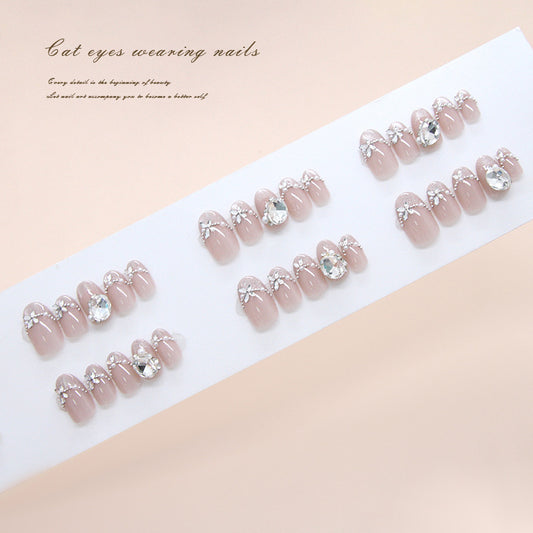 Enchanting Elegance Short Oval Blush Pink Press On Nail Set with Dazzling Rhinestone Accents