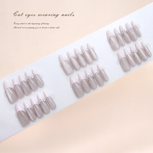 Enchanting Elegance Long Almond Pink and Beige Nails with Sparkling Gems