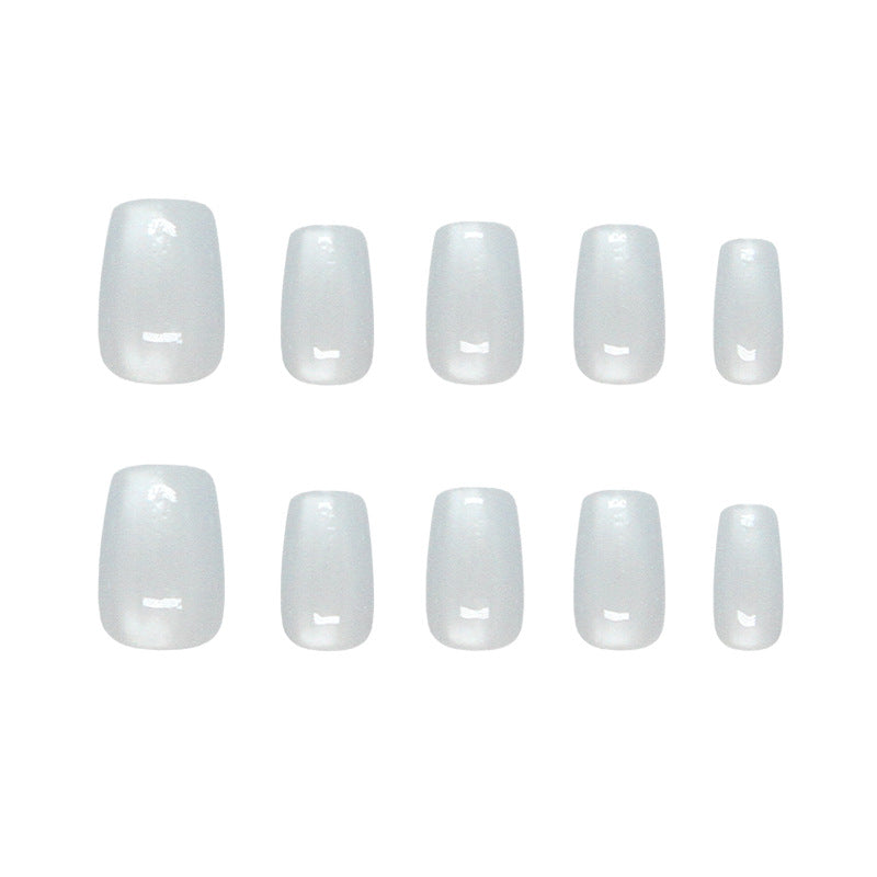 Elegant Winter Wonderland Medium Coffin White Glossy Press-On Nail Set Featuring a Unique Smooth Finish