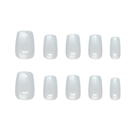Elegant Winter Wonderland Medium Coffin White Glossy Press-On Nail Set Featuring a Unique Smooth Finish