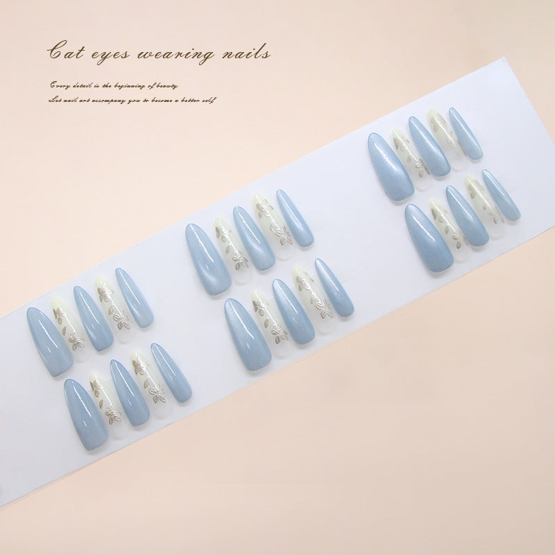 Enchanting Cat Eye Elegance Long Almond Shaped Soft Blue with Floral Accents Press on Nail Set