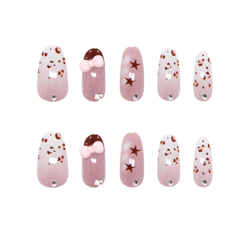Whimsical Chocolate Delight Long Oval Pink Press on Nail Set with Charming Bow and Star Accents