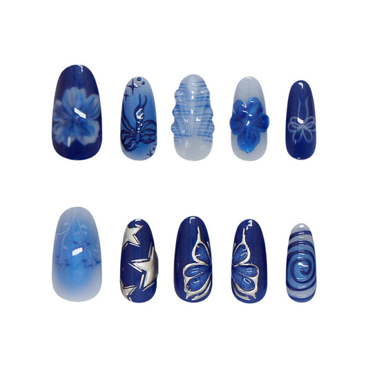 Oceanic Serenity Blue Medium Almond Press-On Nail Set with Unique Floral and Artistic Designs