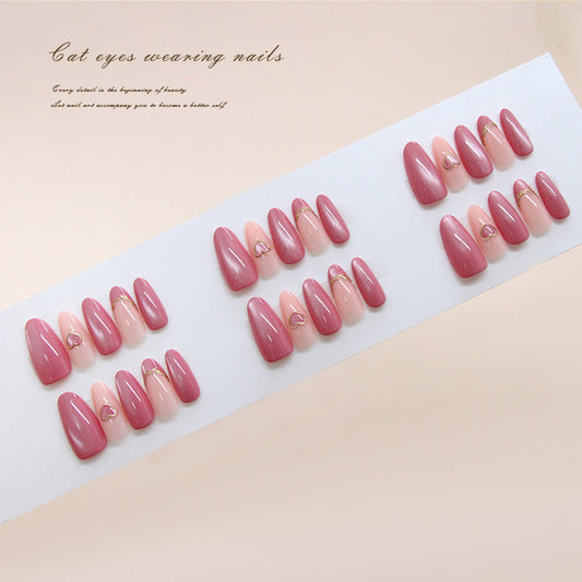Charming Elegance Long Almond Pink Ombre Nails with Heart Accents