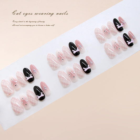 Whimsical Cat-Themed Long Oval Pink and Black Press-On Nails Featuring Charming Ribbons and Glitter Accents