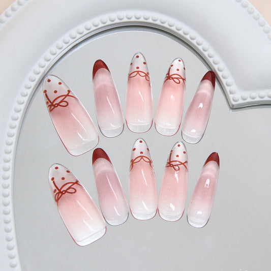 Whimsical Blush Gradient Long Almond Shaped Press-On Nail Set with Delicate Bow Accents