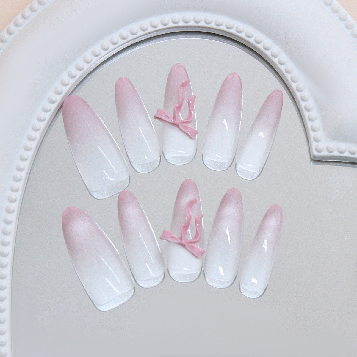 Charming Blossom Long Almond Pink Ombre Nails with Elegant Ribbon Detail