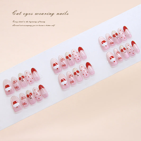 Festive Charm Long Oval Pink Press On Nail Set with Cute Christmas Designs