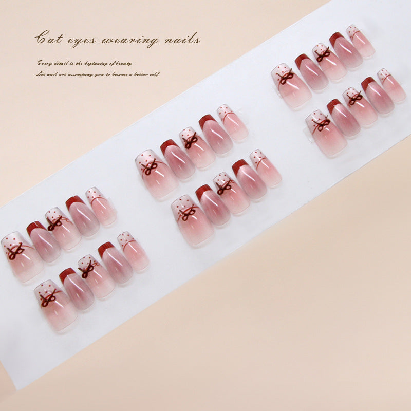 Whimsical Elegance Long Coffin Pink Gradient Nails with Adorable Bow Design