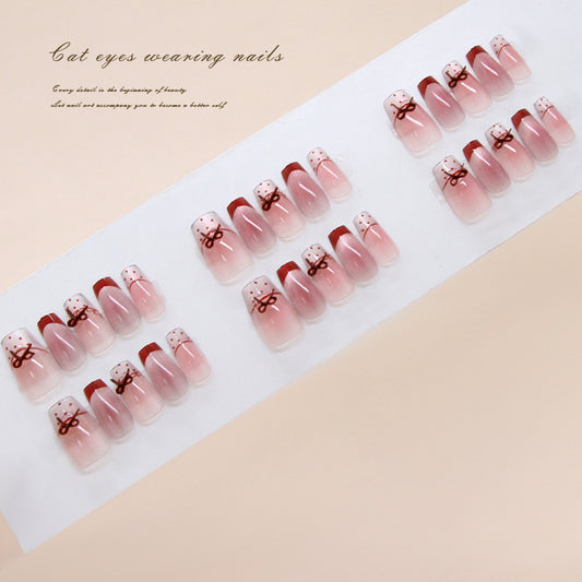 Whimsical Elegance Long Coffin Pink Gradient Nails with Adorable Bow Design