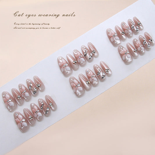 Enchanted Garden Cat Eye Press On Nail Set Blush Long Oval Design with Floral Accents and Glittering Gems