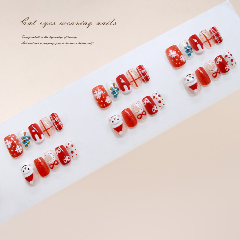 Festive Holiday Spirit Red Short Square Press-On Nail Set with Playful Santa and Snowflake Designs