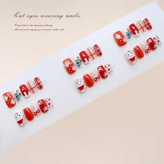 Festive Holiday Spirit Red Short Square Press-On Nail Set with Playful Santa and Snowflake Designs
